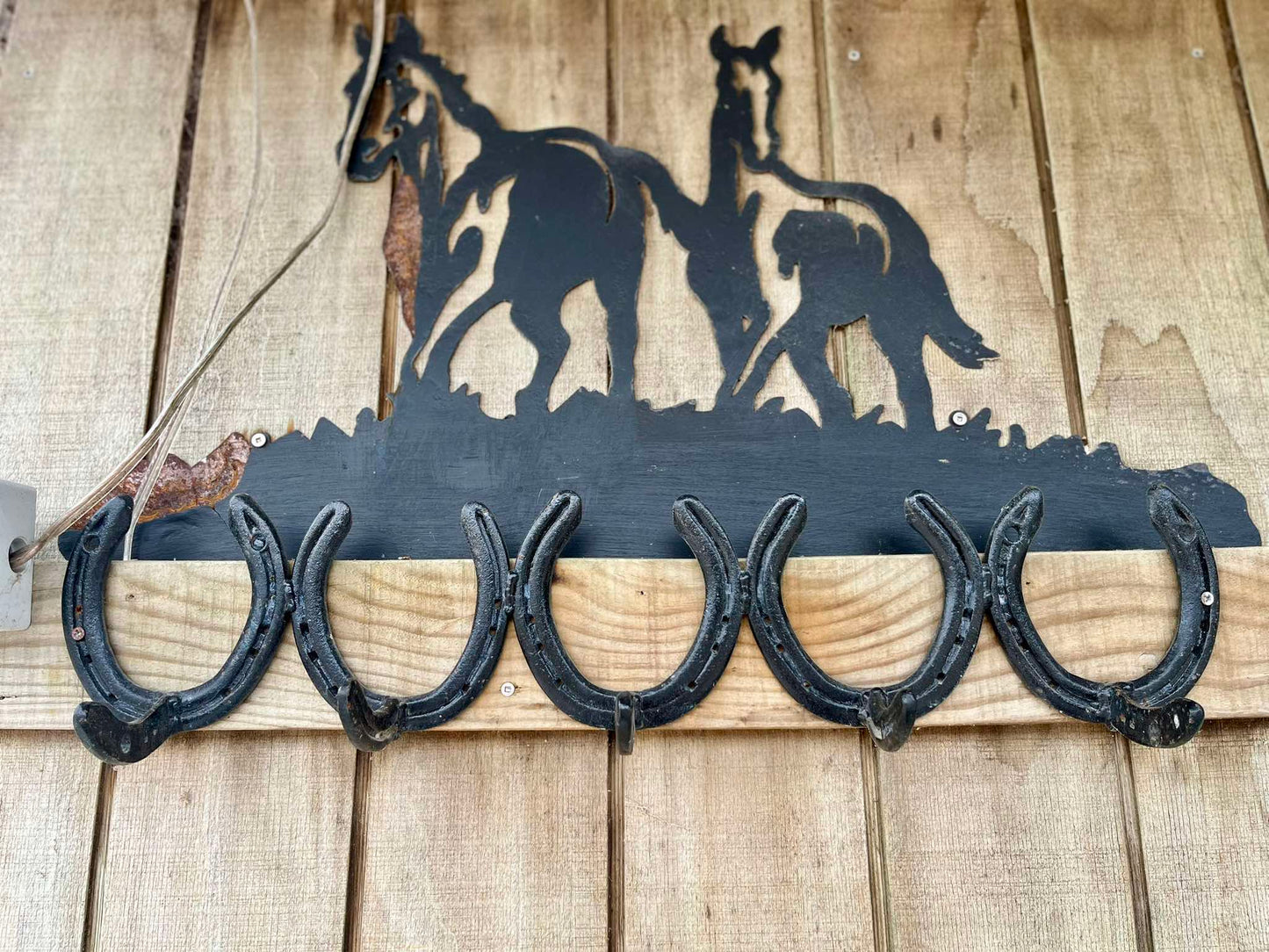 Horse shoe halter rack